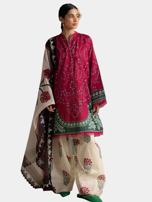 Woman wearing a traditional outfit with a pink and white design against a beige and green background