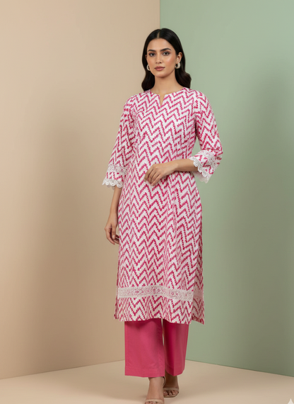 Woman wearing a pink and white chevron patterned kurta with white lace trim against a beige and green background.