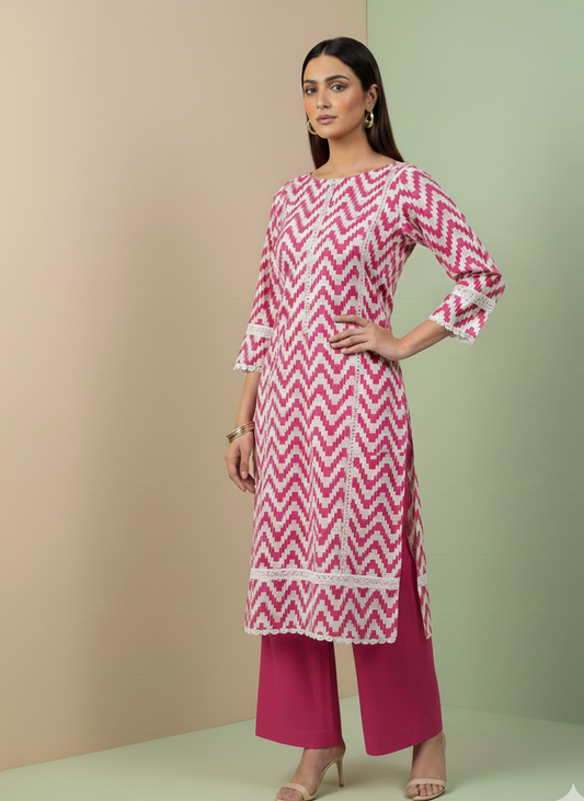 Woman wearing a pink and white chevron patterned kurta with magenta pants against a beige and green gradient background.