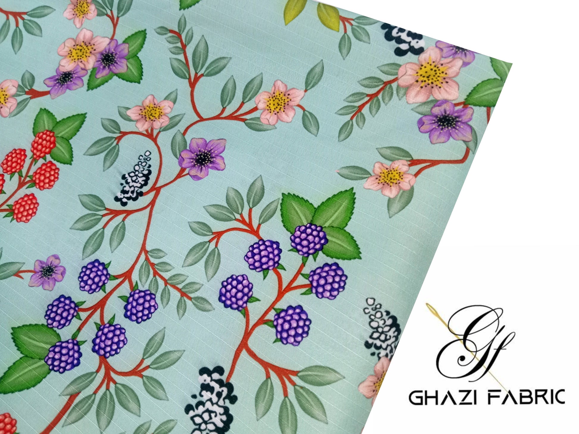 Floral and berry patterned fabric with Ghaazi Fabric logo.