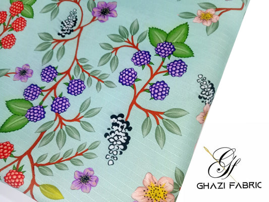 Floral and berry patterned fabric with Ghazi Fabric logo.