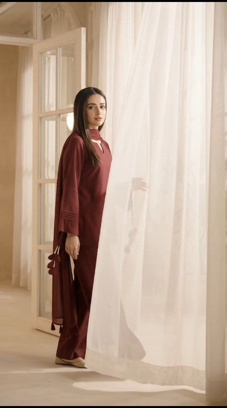 Ghazi Fabric maroon 2 piece stitched suit for women with tassel sleeve detailing